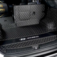 Black/white Full Cargo Trunk mat/liner, partial for Honda, BMW, Ford, VOLVO, Nissan, Hyundai, Jeep aerial view with a logo